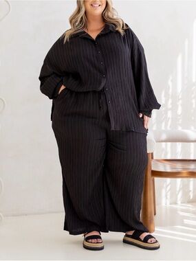 Proud Poppy Gina pant in textured black size 24